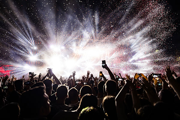 excited-audience-watching-confetti-fireworks-having-fun-music-festival-night-copy-space Outdoor Events